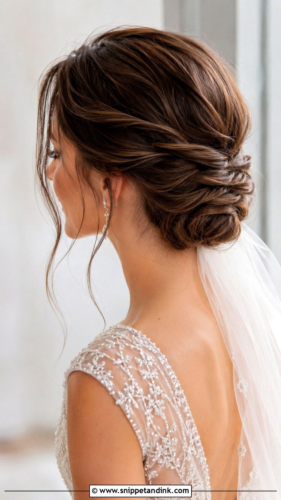 Twisted Low Bun - Snippet and Ink - 25 Long Hair Wedding Hairstyles