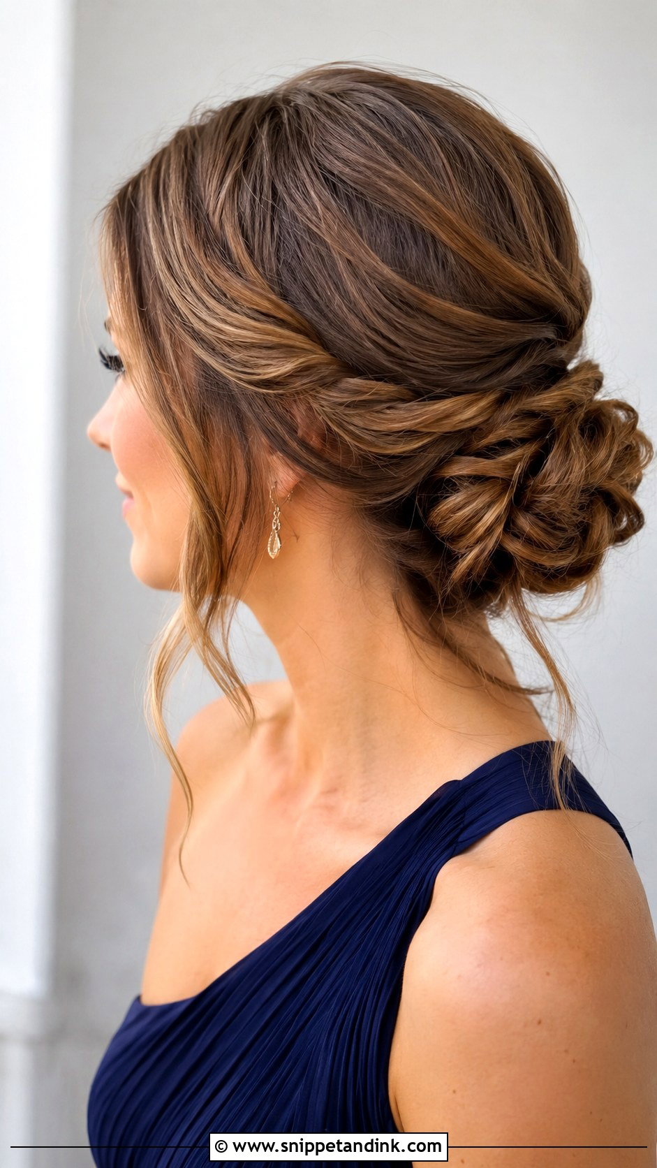 Twisted Low Bun - Snippet and Ink - 25 Simple Hairstyles for Wedding Guest