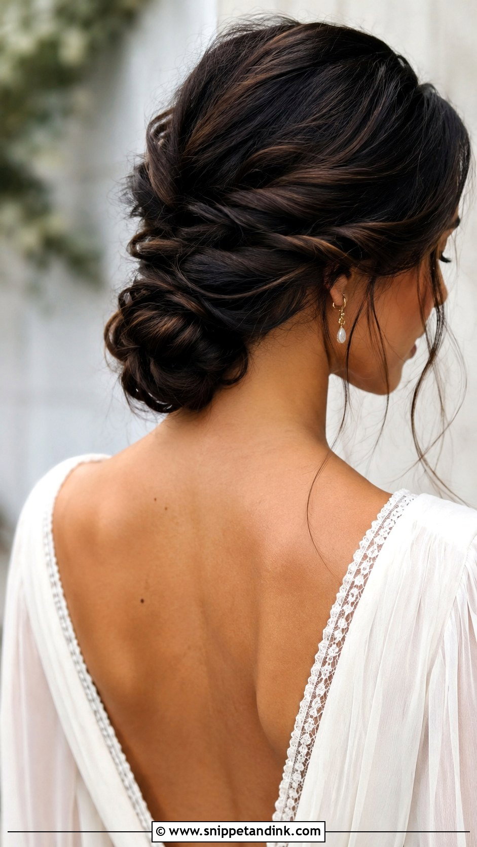 Twisted Low Bun - Snippet and Ink - 20 Cute Bun Hairstyles for Wedding