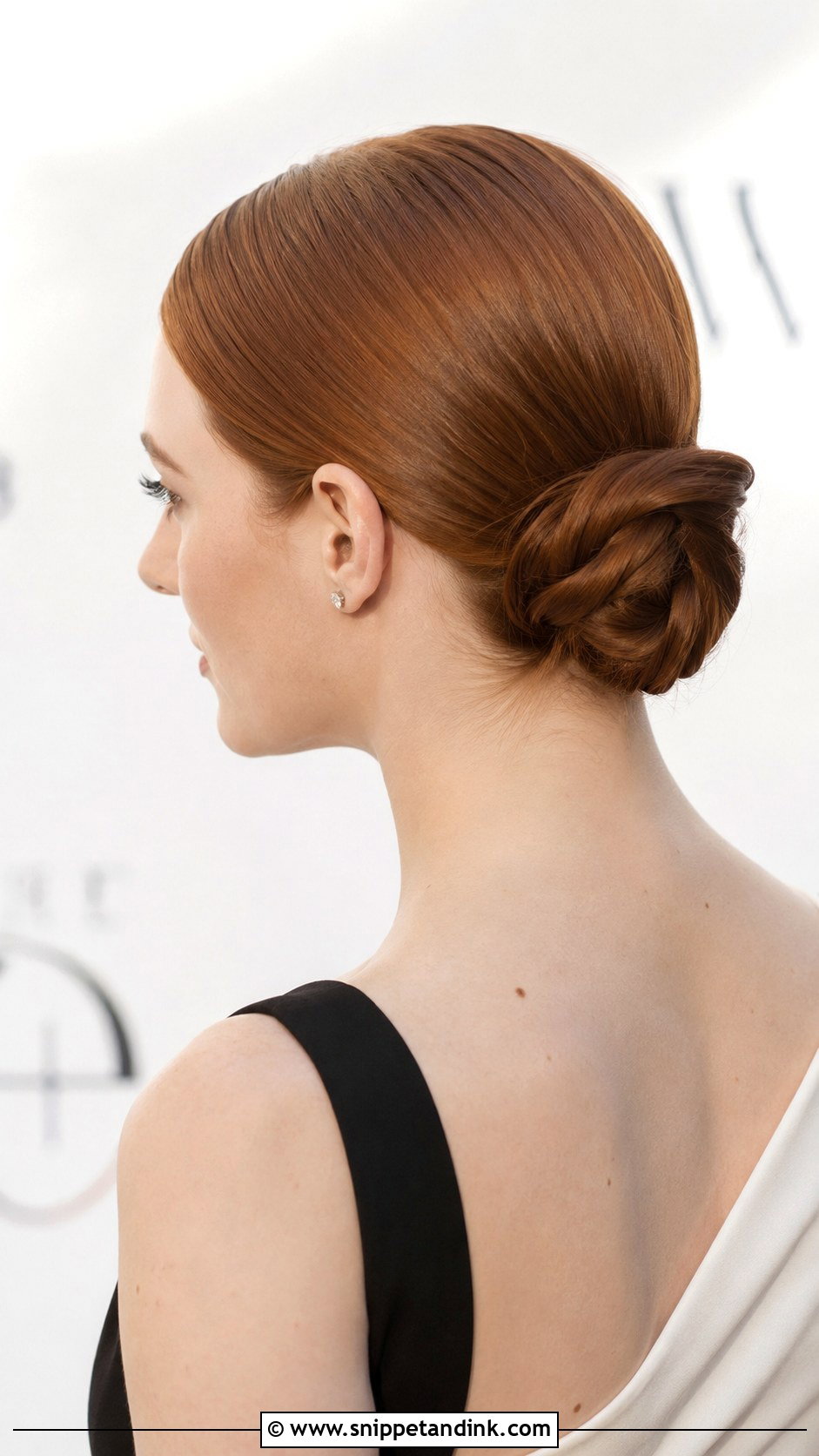 Twisted Low Bun - Snippet and Ink - 30 Wedding Guest Updo Hairstyles