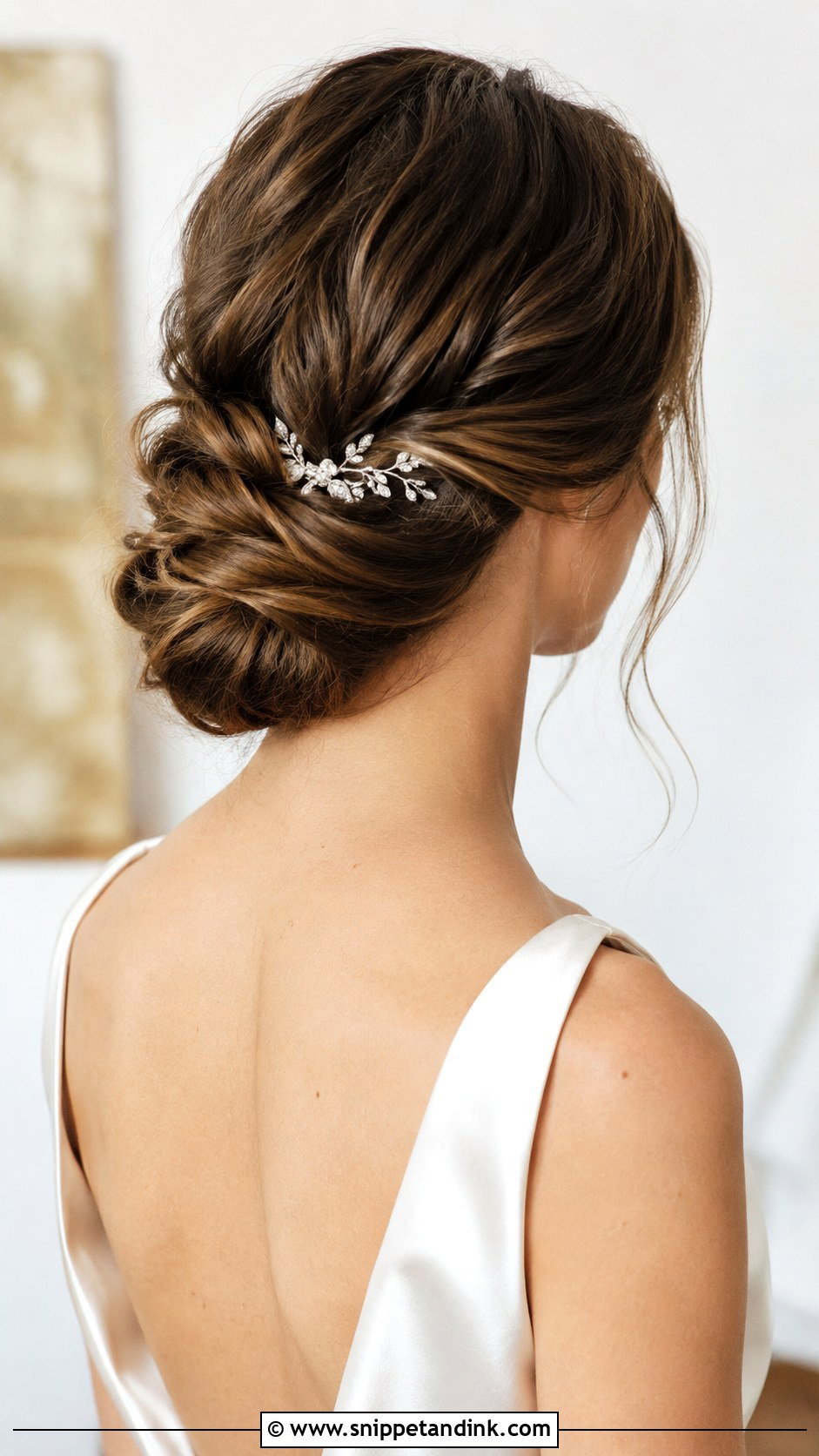 Twisted Low Bun - Snippet and Ink - 20 Elopement Hairstyles