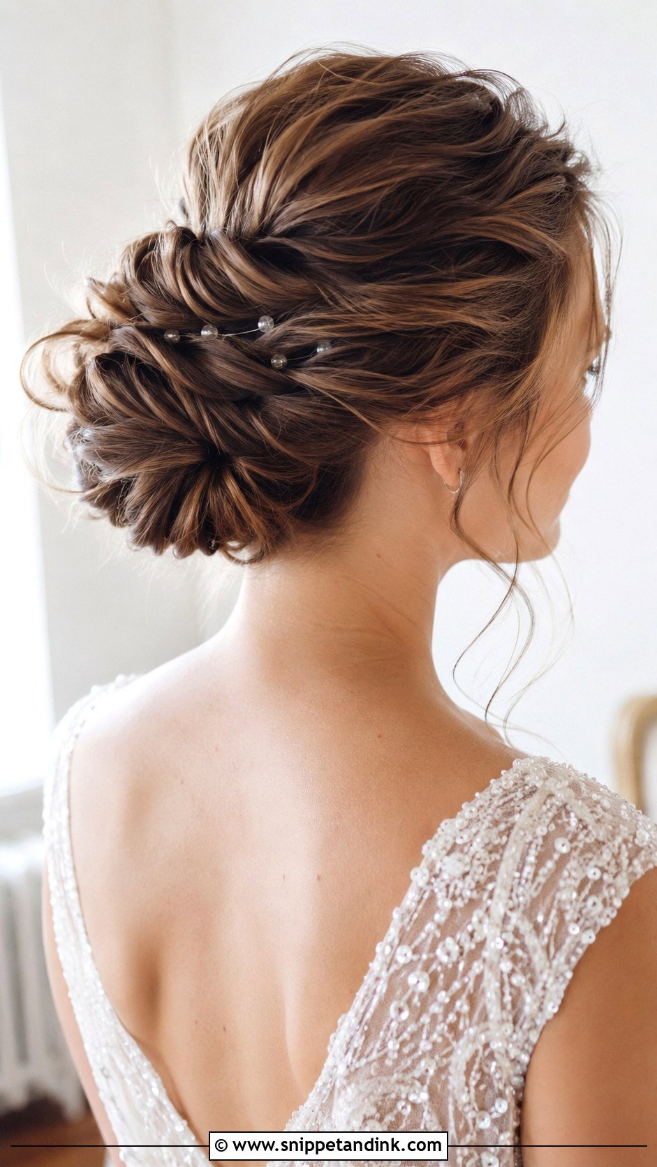 Twisted Low Bun Updo - Snippet and Ink - 25 Wedding Bun Hairstyle Ideas