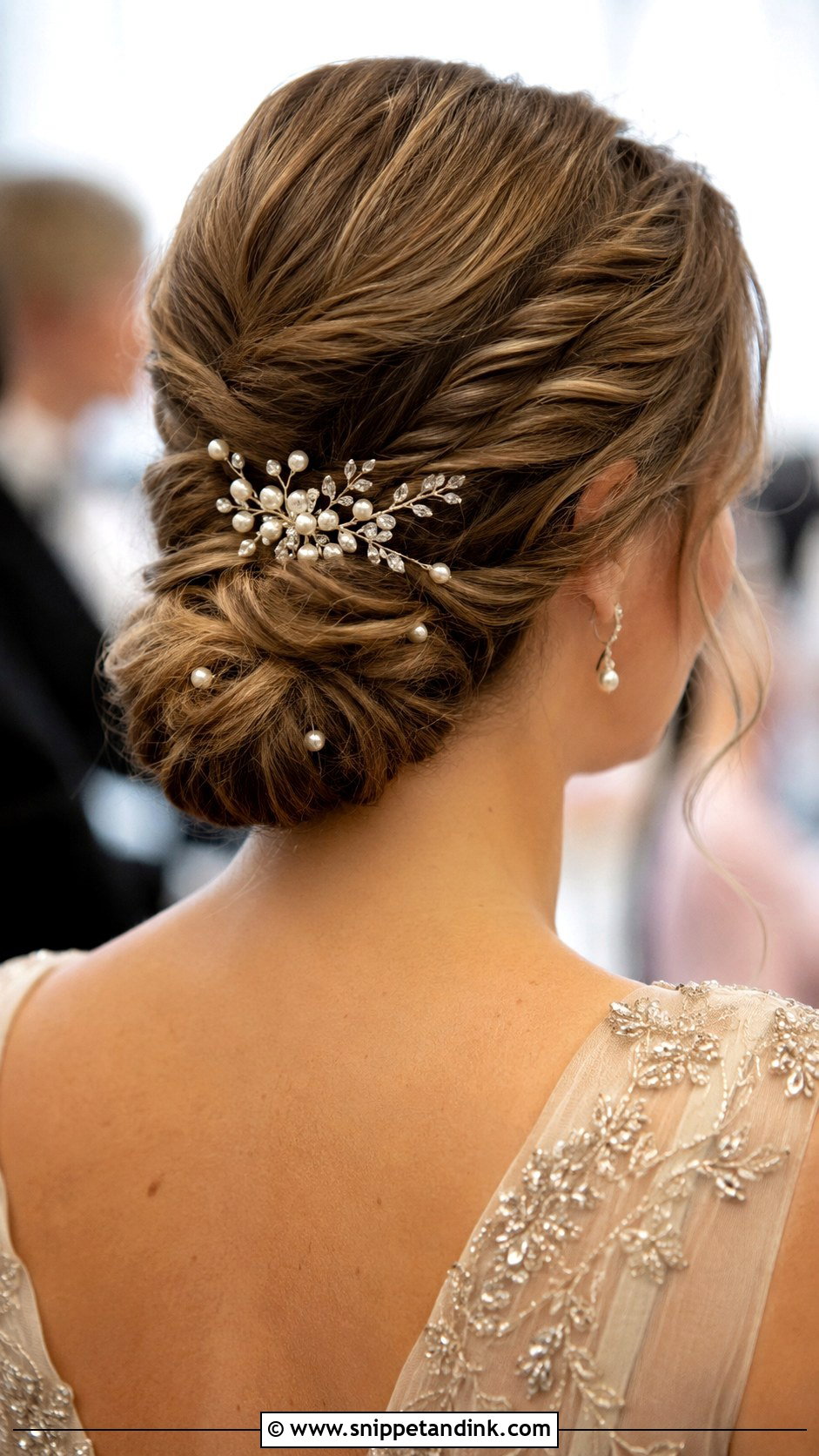 Twisted Low Bun With Accessories - Snippet and Ink - 20 Wedding Party Hairstyles for Medium Hair