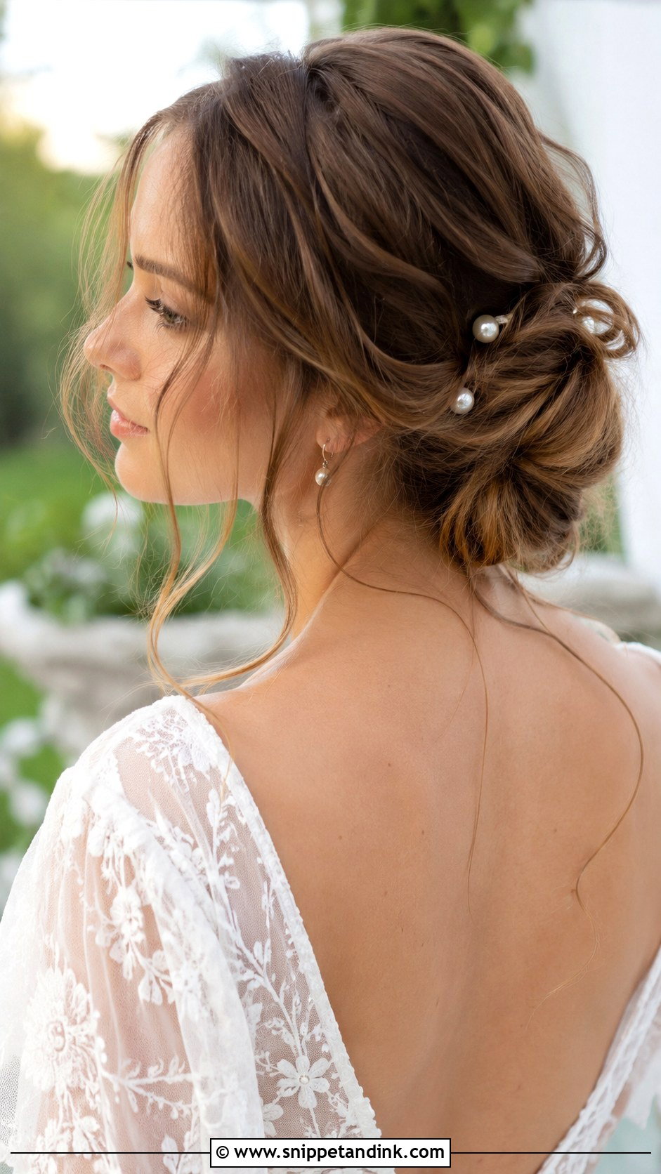 Twisted Low Bun With Loose Tendrils - Snippet and Ink - 20 Wedding Hairdos for Medium Length