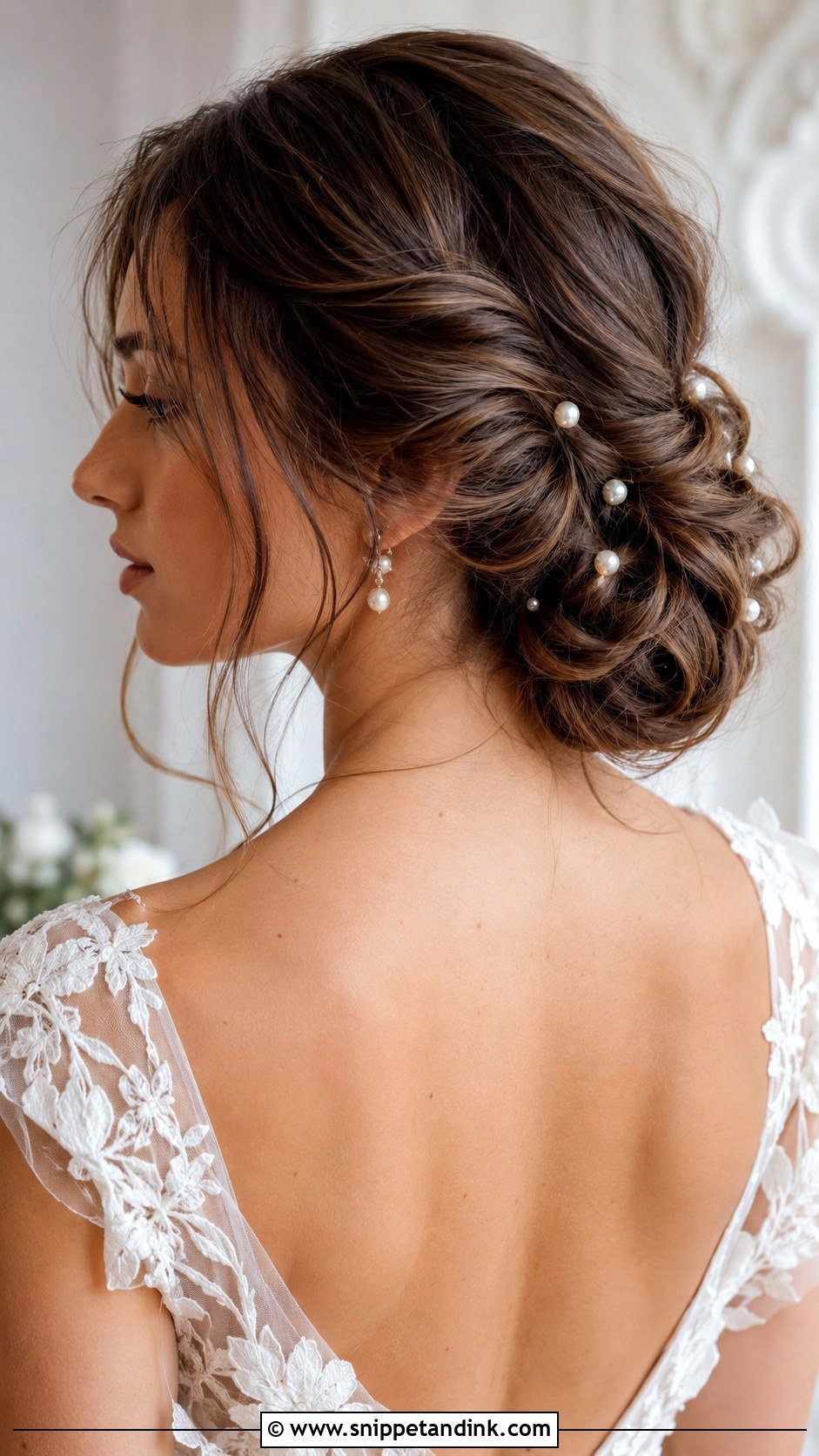 Twisted Low Bun With Pearl Pins - Snippet and Ink - 20 Bridal Hair Front View Ideas
