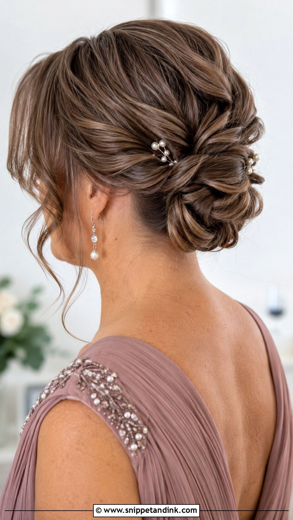 Twisted Low Bun for Mother of the Bride - Snippet and Ink - 30 Mother of Bride Hairstyles