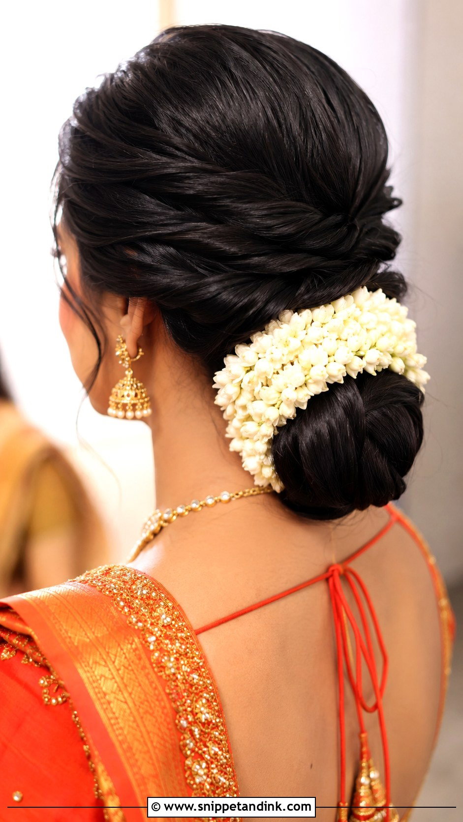 Twisted Low Bun with Jasmine - Snippet and Ink - 30 Mehndi Hairstyles for Bride