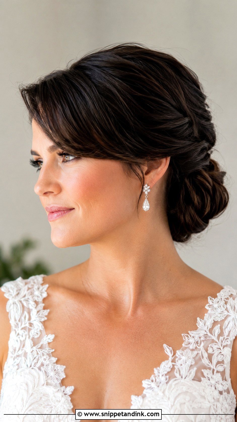 Twisted Low Bun with Side Bangs - Snippet and Ink - 25 Bridal Hairstyles with Bangs