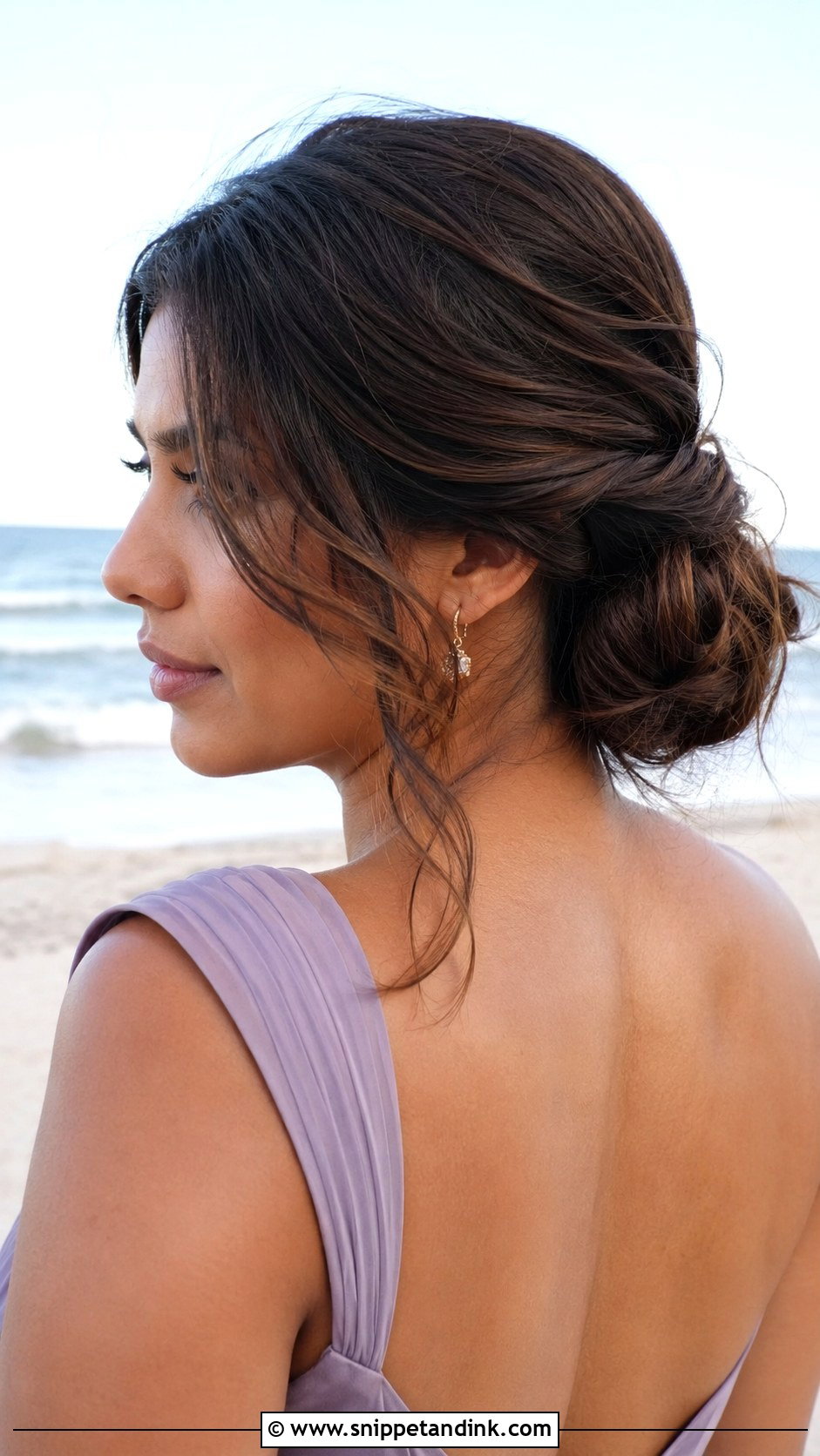Twisted Low Bun - Snippet and Ink - 20 Beach Wedding Guest Hairstyles