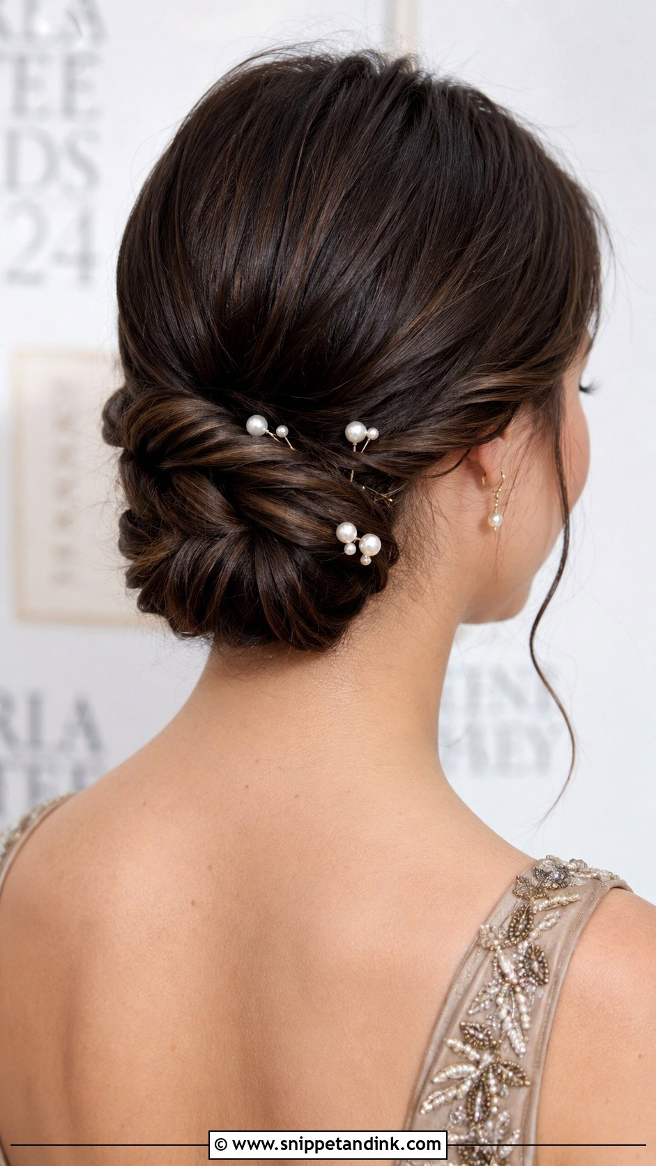 Twisted Low Chignon - Snippet and Ink - 35 Wedding Guest Hair Ideas