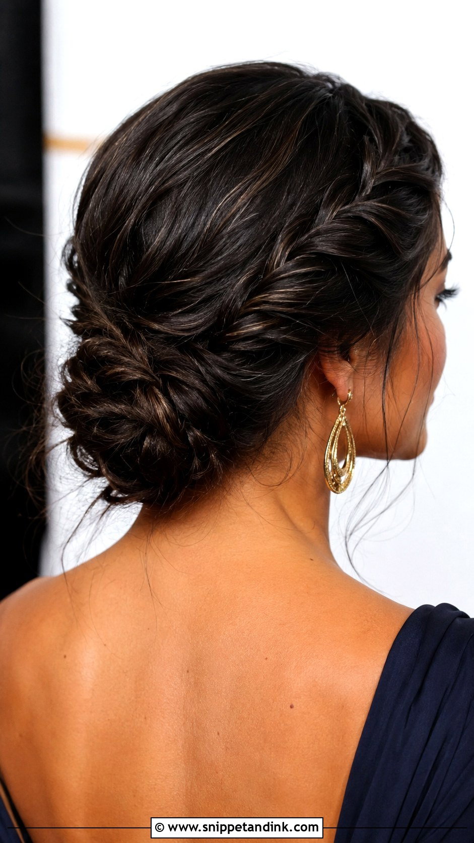 Twisted Low Updo - Snippet and Ink - 20 Long Black Tie Hairstyles