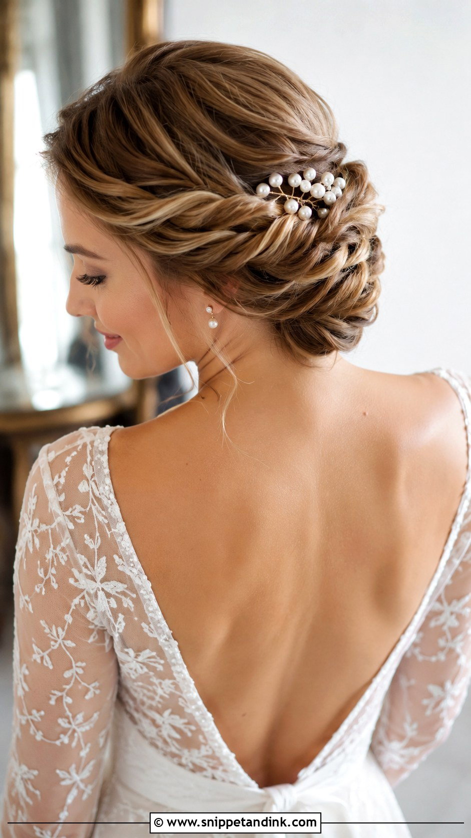 Twisted Low Updo - Snippet and Ink - 25 Modern Bridal Hair Ideas
