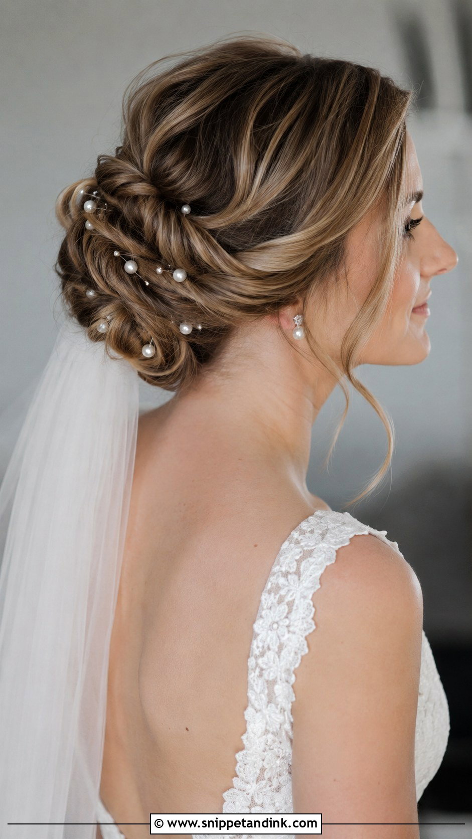 Twisted Low Updo With Pearl Pins - Snippet and Ink - 20 Fall Wedding Hair Ideas