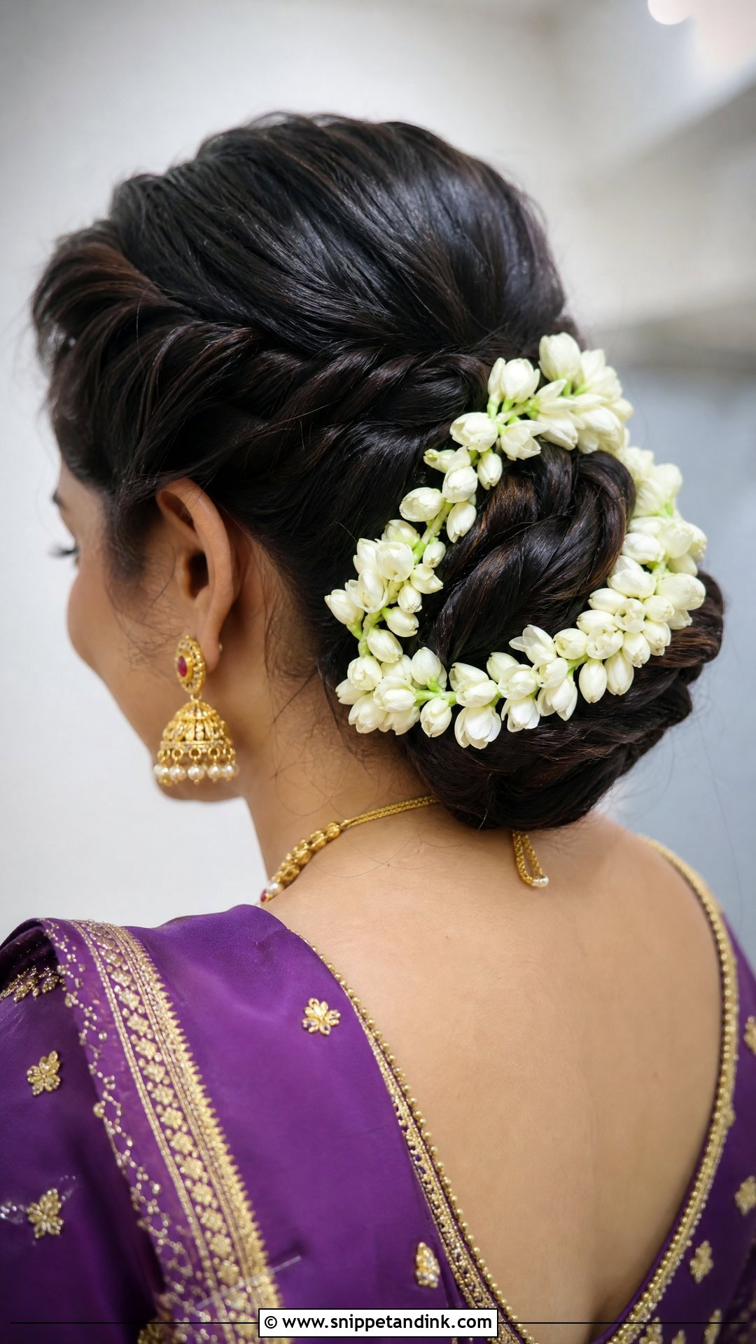 Twisted Updo With Mogra Strings - Snippet and Ink - 20 Hairstyles for South Indian Wedding