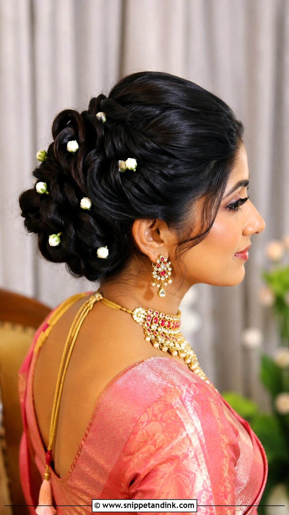 Twisted Updo with Floral Pins - Snippet and Ink - 25 Kerala Hindu Bridal Hairstyles