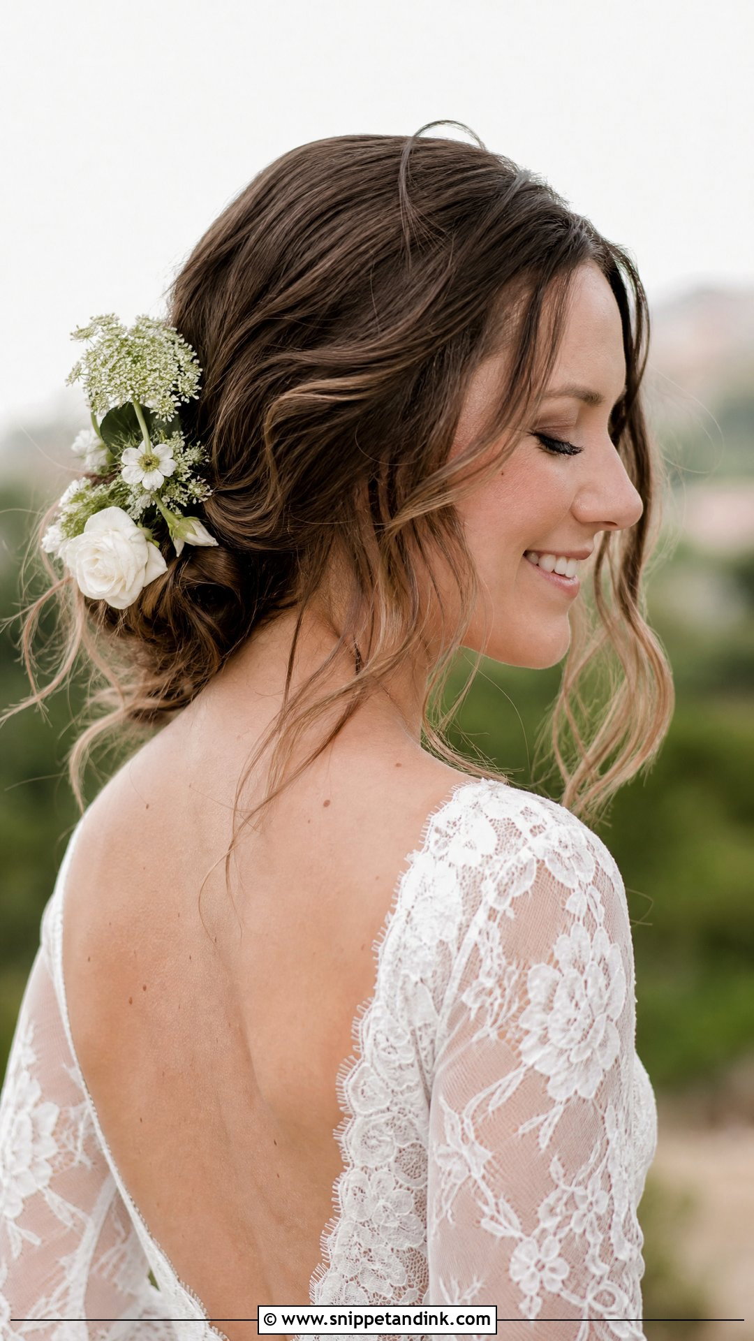Undone Bun With Flyaways - Snippet and Ink - 20 Bride Hairstyles Front View