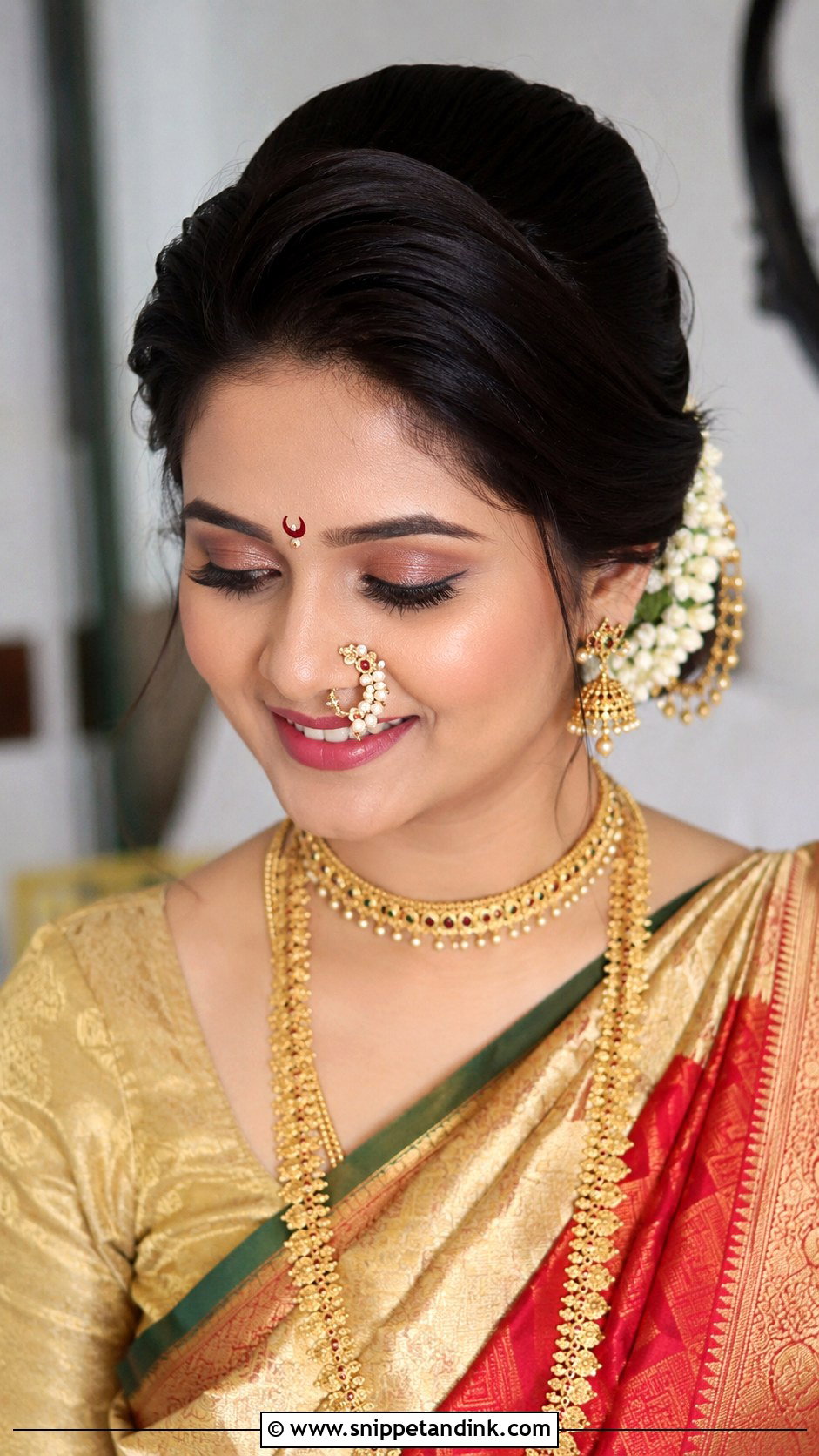 Vintage Roll Bun - Snippet and Ink - 25 Marathi Bride Hairstyle Ideas