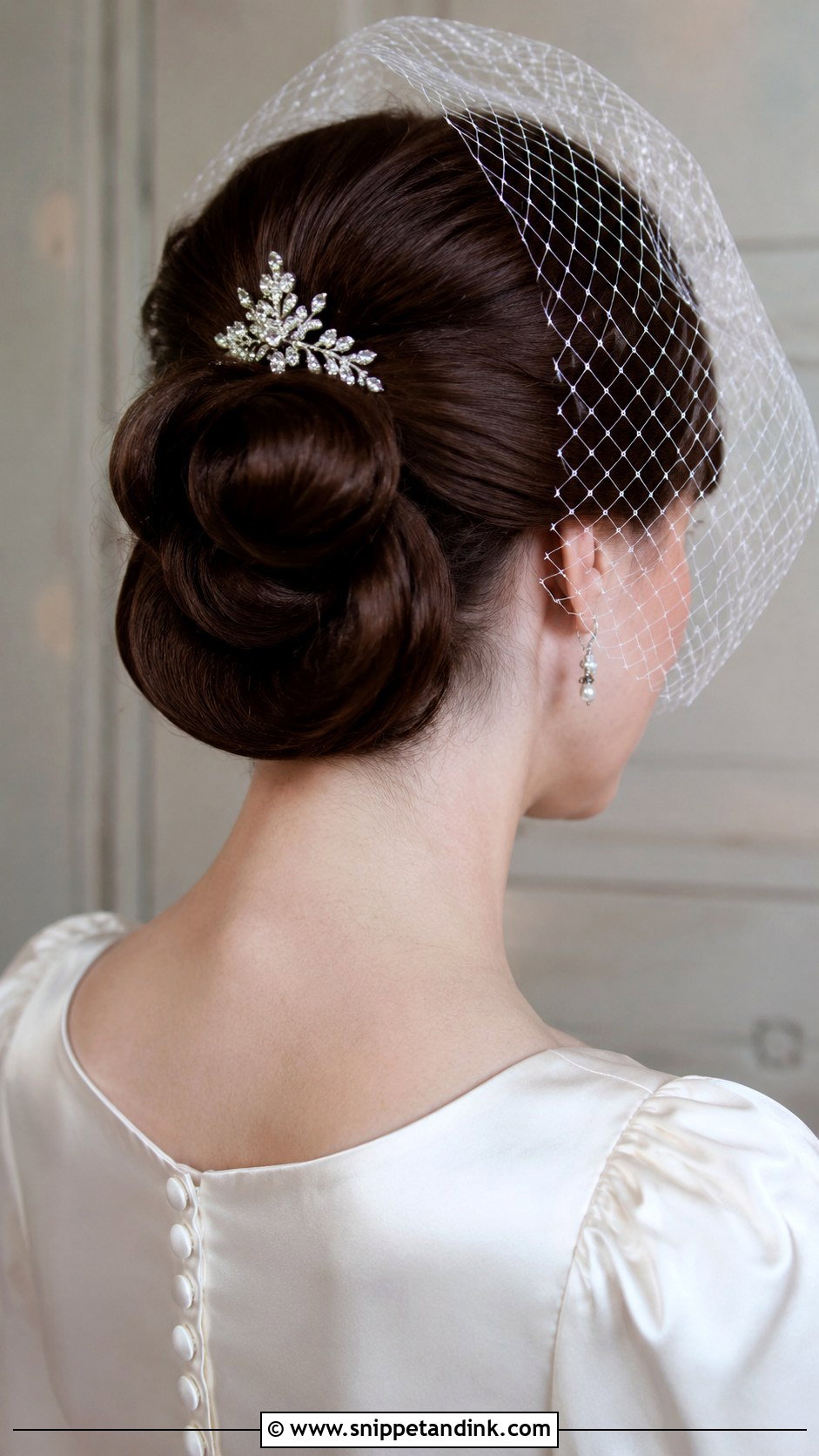 Vintage Rolled Bun Updo - Snippet and Ink - 25 Wedding Bun Hairstyle Ideas