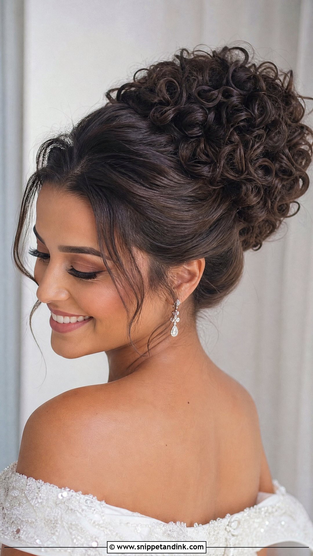 Voluminous Curly Bridal Bun - Snippet and Ink - 15 Curly Bridal Bun Ideas