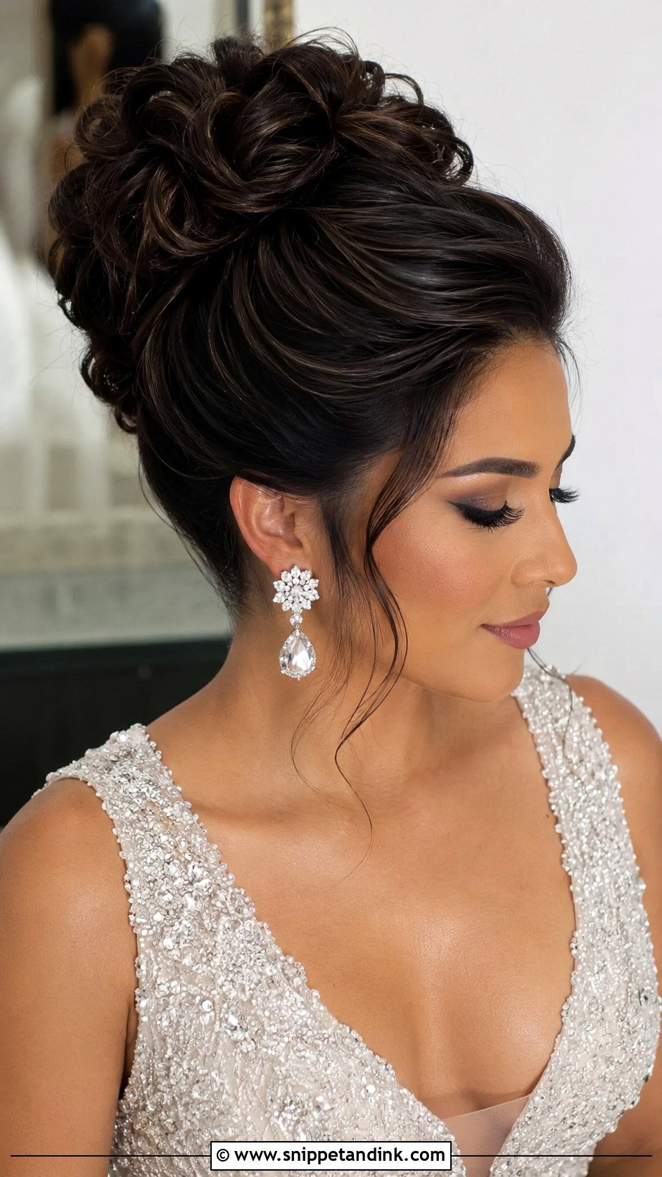 Voluminous High Bun Like J Lo - Snippet and Ink - 20 Hollywood Wedding Hair Ideas