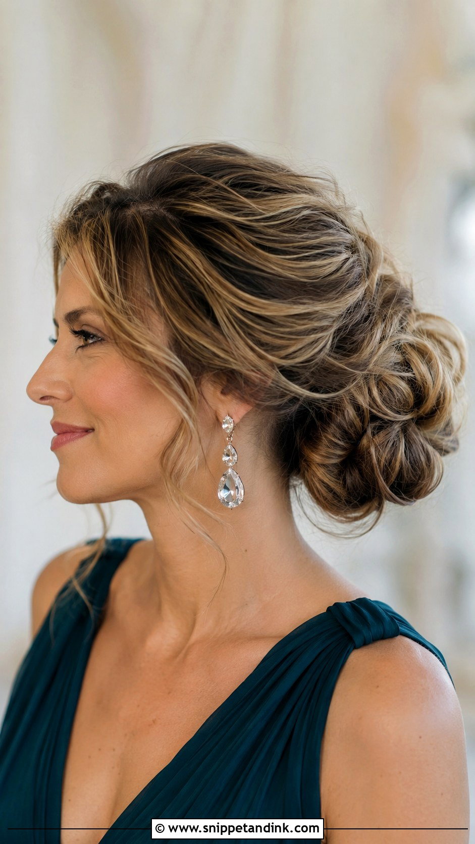 Voluminous Low Bun For Wedding Guest - Snippet and Ink - 15 Hair Bun for Wedding Guest Ideas