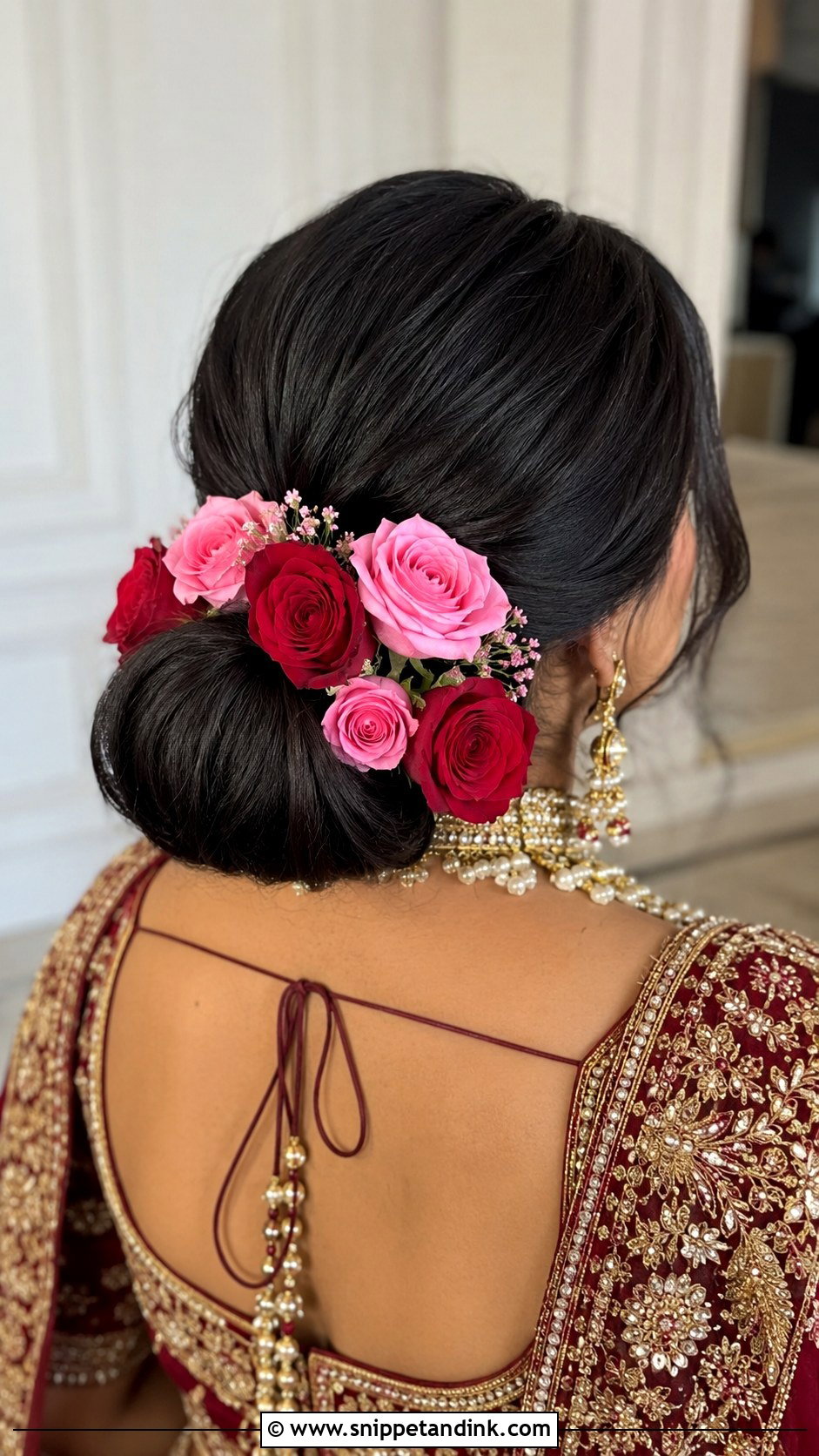 Voluminous Low Bun With Roses - Snippet and Ink - 25 Mehndi Hairstyles for Bride Sister