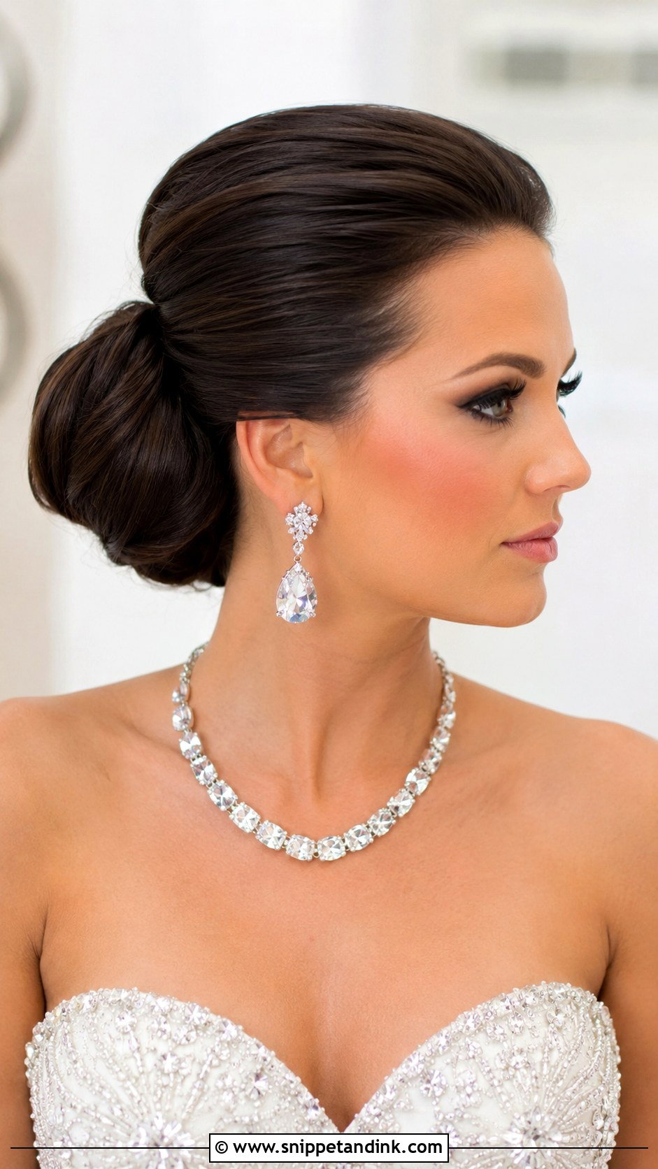 Voluminous Slicked Back Chignon - Snippet and Ink - 25 Bride Hair Updo Ideas