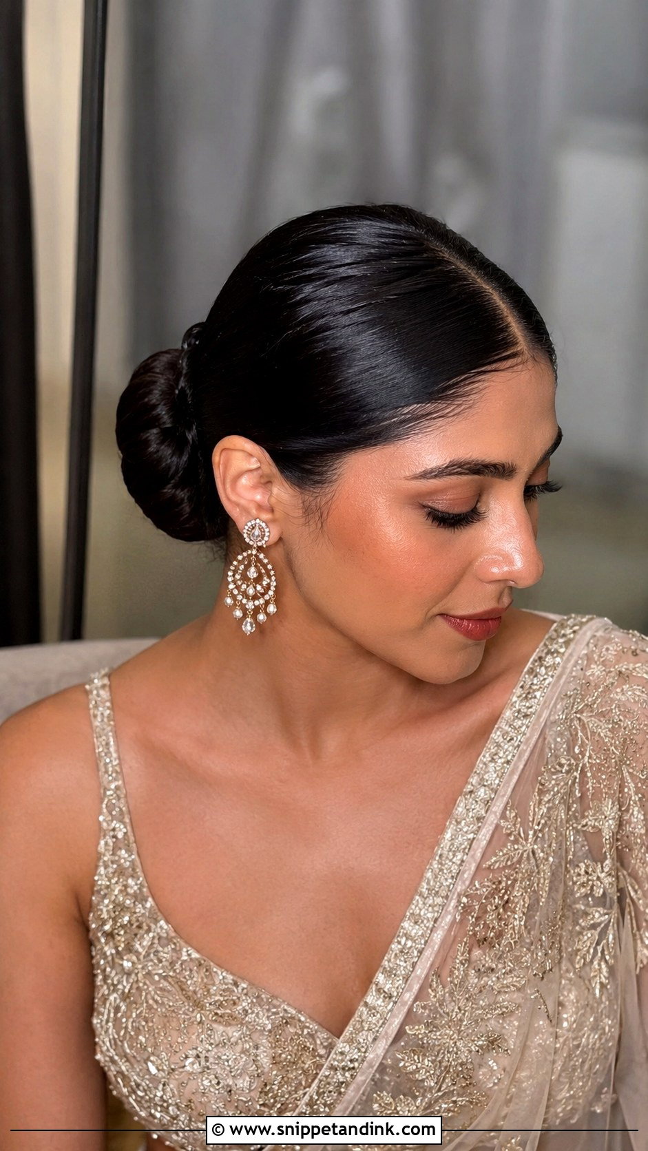 Walima Bridesmaid Sleek Bun - Snippet and Ink - 25 Walima Bridesmaid Hairstyles
