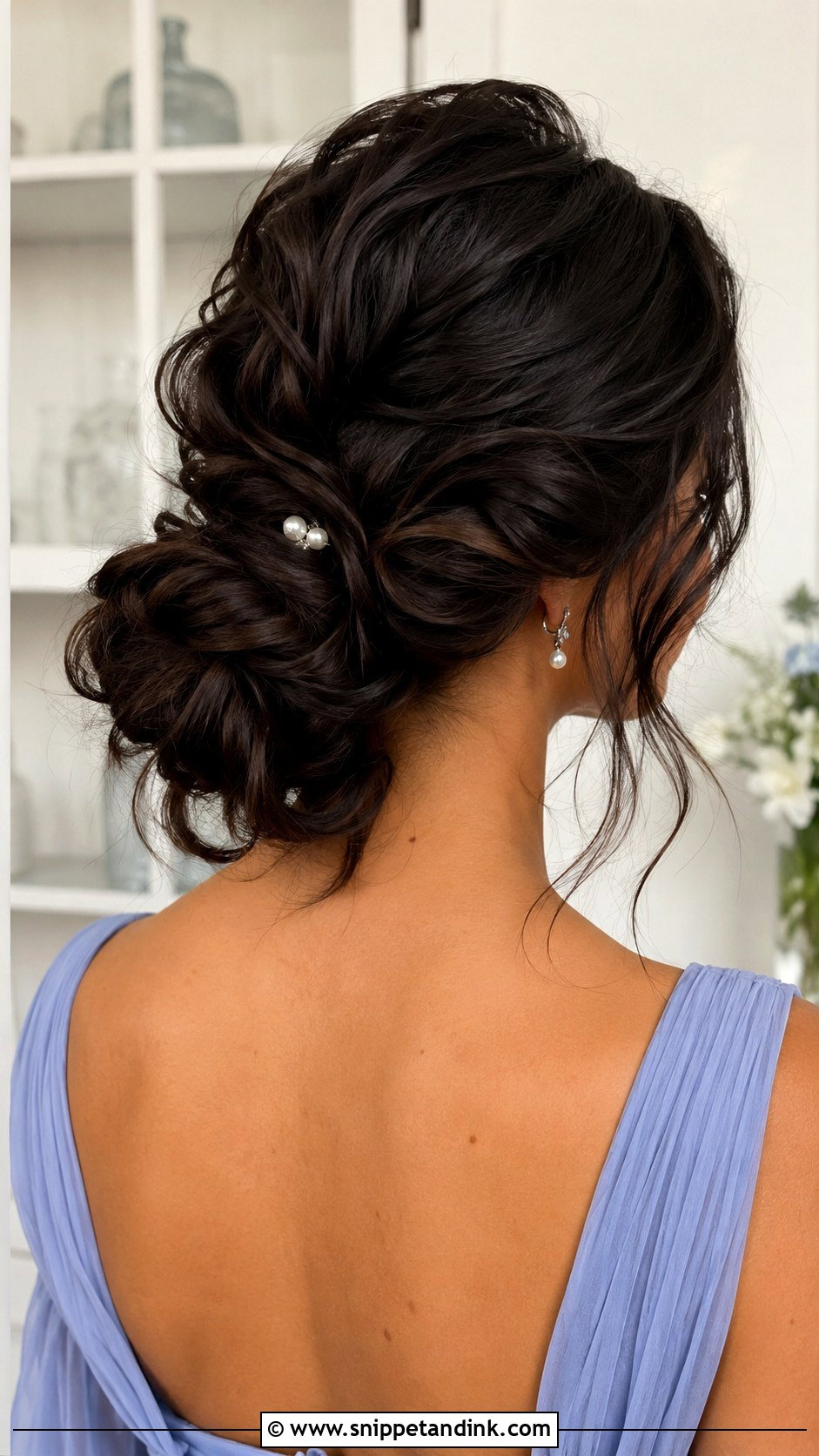 Wavy Low Bun Wedding Guest Hairstyle - Snippet and Ink - 15 Wavy Hair Wedding Guest Hairstyles