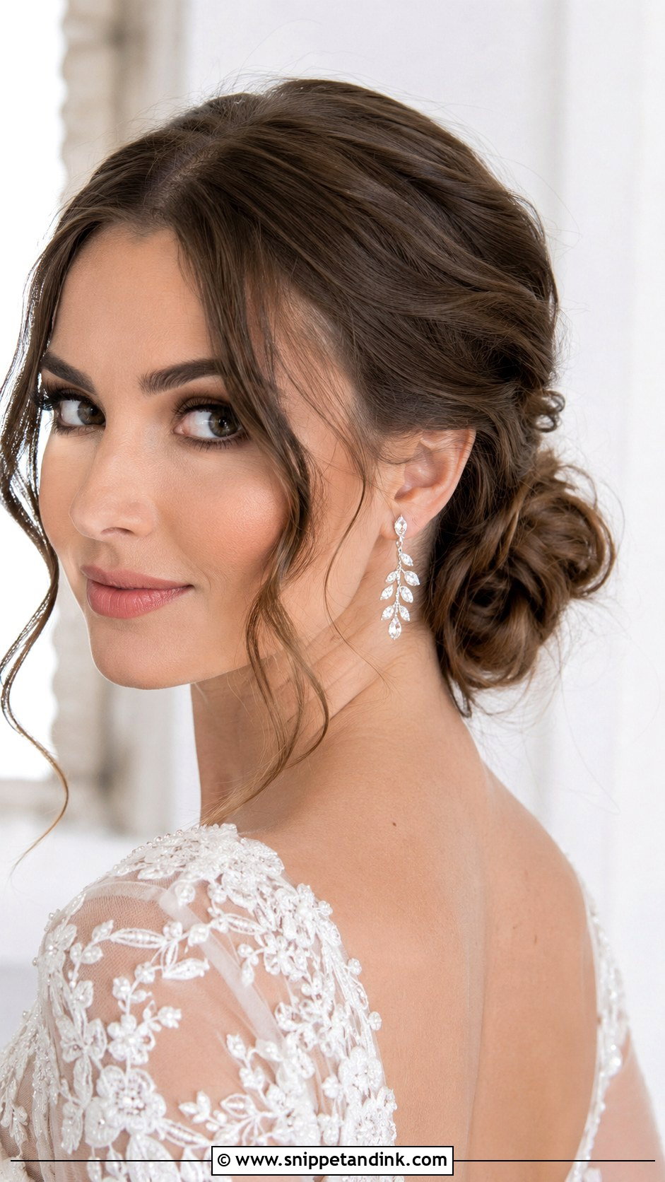 Wavy Low Bun With Face Framing Waves - Snippet and Ink - 20 Long Wavy Wedding Hair Ideas