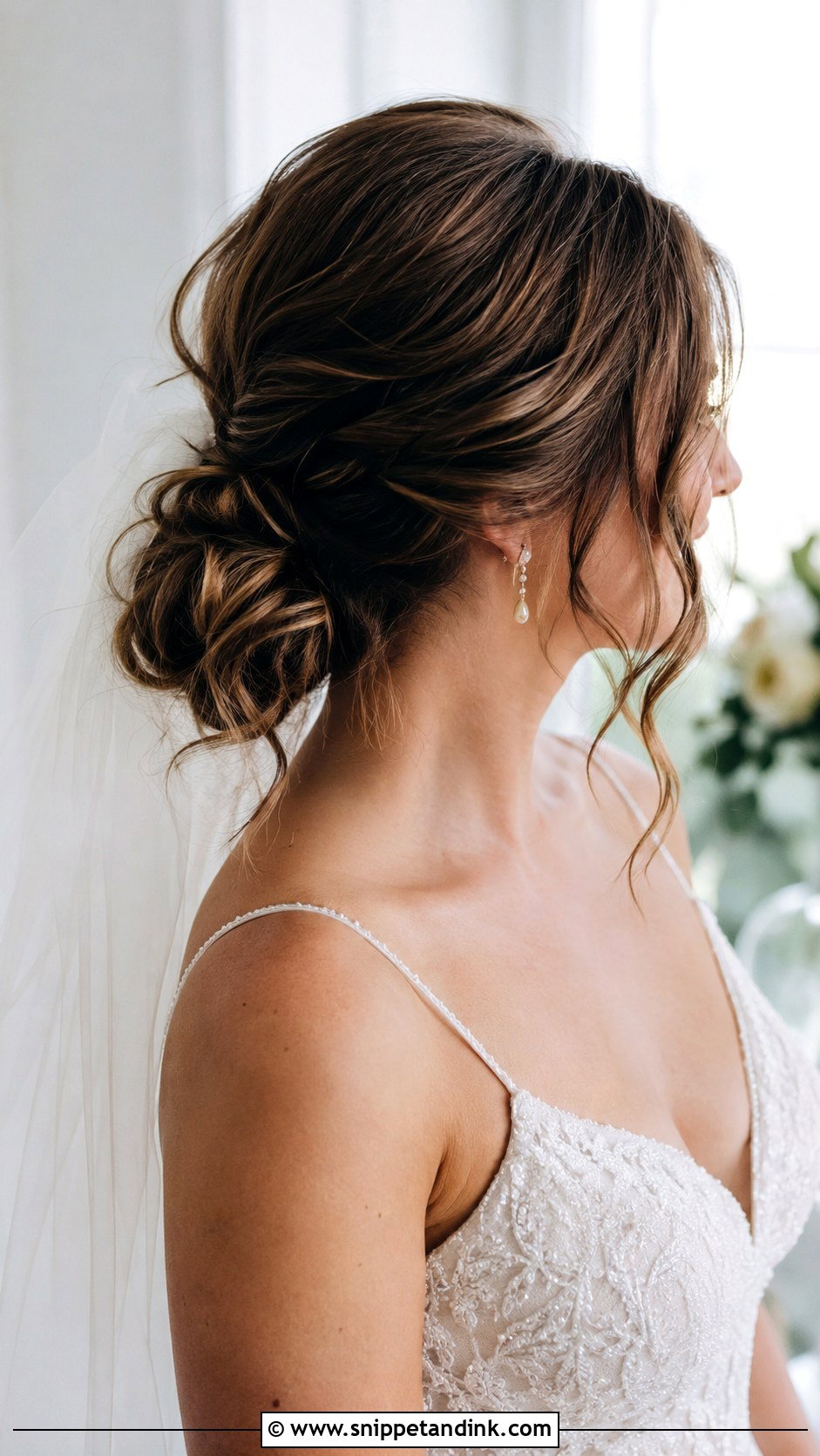 Wavy Low Bun with Face Framing Pieces - Snippet and Ink - 25 Wavy Bridal Hair Ideas