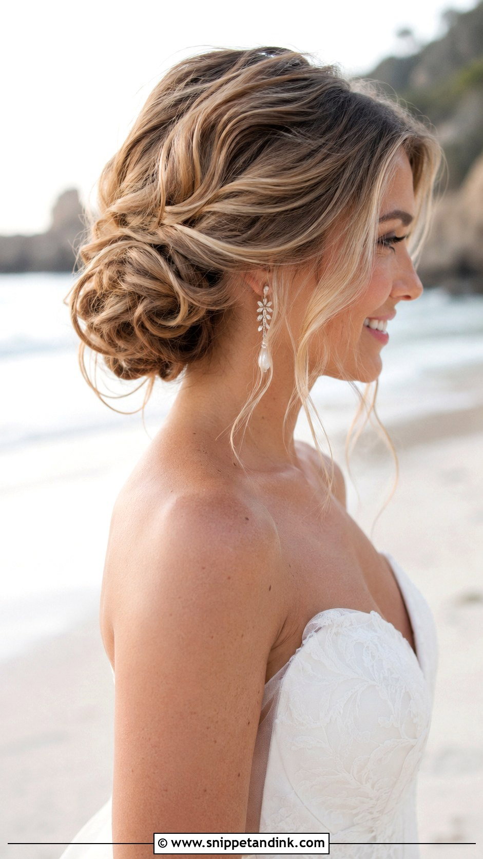 Wavy Low Bun - Snippet and Ink - 20 Low Bun Wedding Guest Hair Ideas