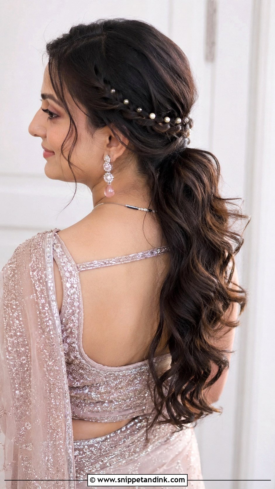 Wavy Low Ponytail With Side Braid - Snippet and Ink - 20 Indian Wedding Ponytail Hairstyles