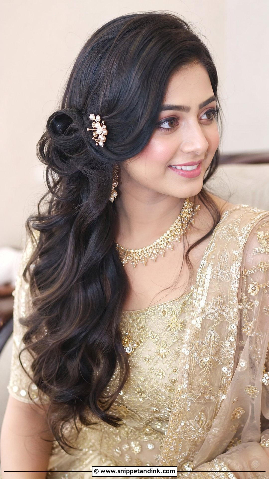 Wavy Open Hair With Side Bun - Snippet and Ink - 20 Bengali Bridal Hairstyle Ideas