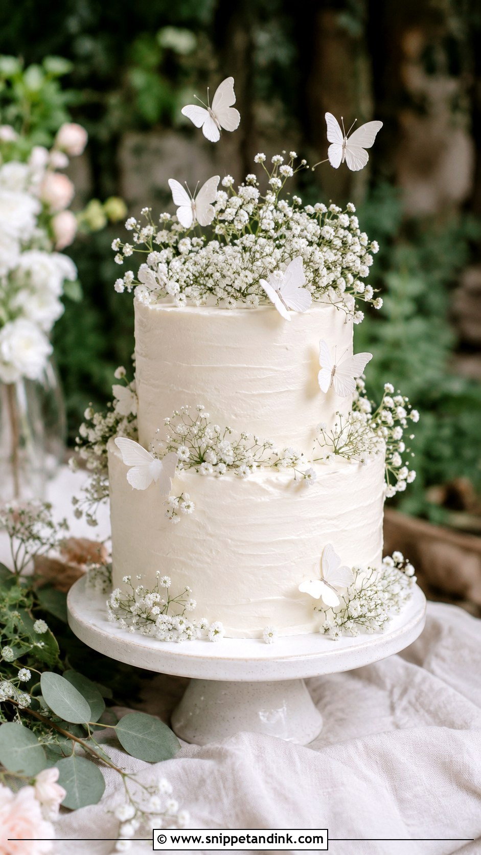 White Butterfly Wedding Cake With Babys Breath - Snippet and Ink - 20 White Cake Ideas with Butterflies for Wedding