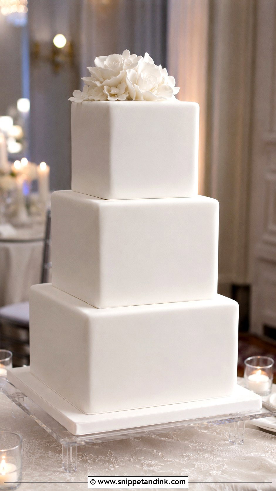 White Fondant Wedding Cake - Snippet and Ink - 20 Minimal White Wedding Cake Ideas