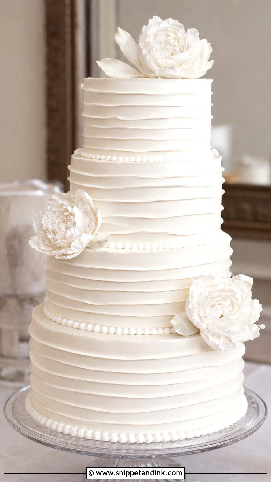 White Piped Wedding Cake With Ruffle Piping - Snippet and Ink - 20 White Piped Wedding Cake Ideas