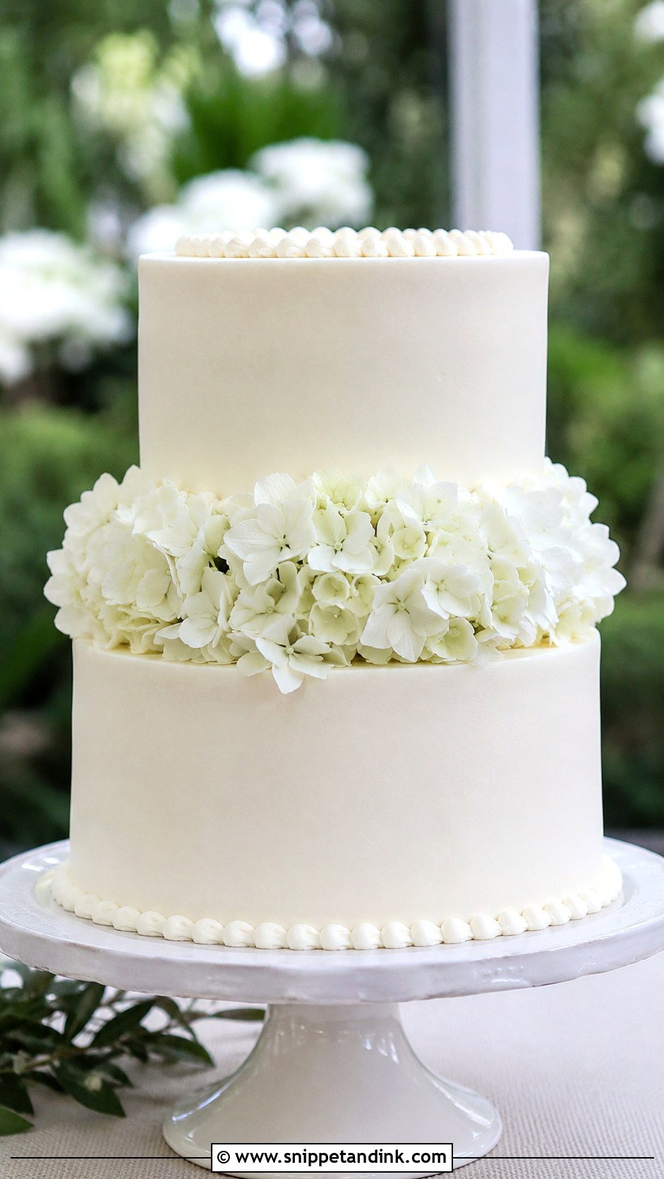 White Wedding Cake With Hydrangeas - Snippet and Ink - 20 Plain White Wedding Cake Ideas