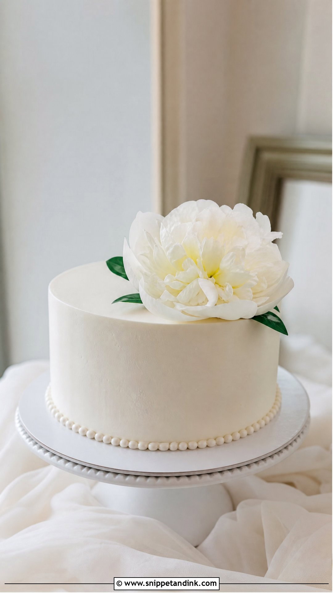 White Wedding Cake With Single Flower - Snippet and Ink - 20 Simple White Wedding Cake Ideas