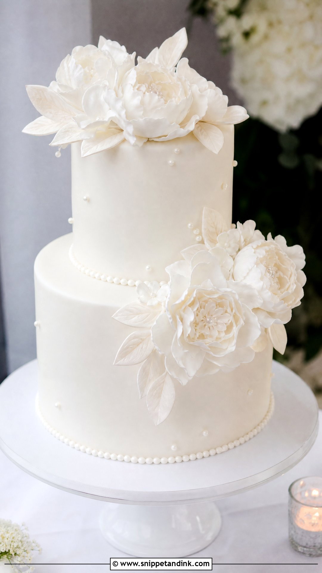 White Wedding Cake With Sugar Flowers - Snippet and Ink - 20 Simple White Wedding Cake Ideas