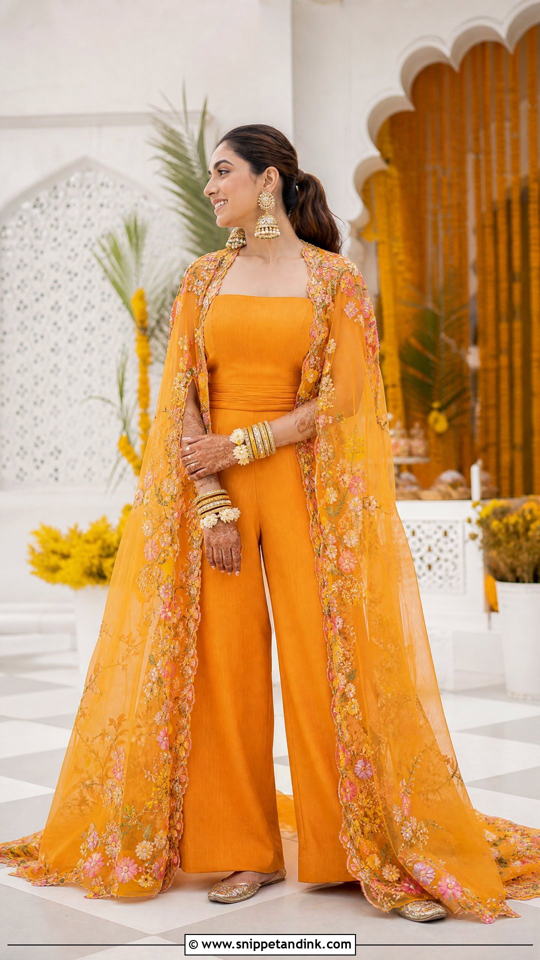Orange Jumpsuit With Sheer Cape - Snippet and Ink - 20 Orange Haldi Outfit for Bride Ideas