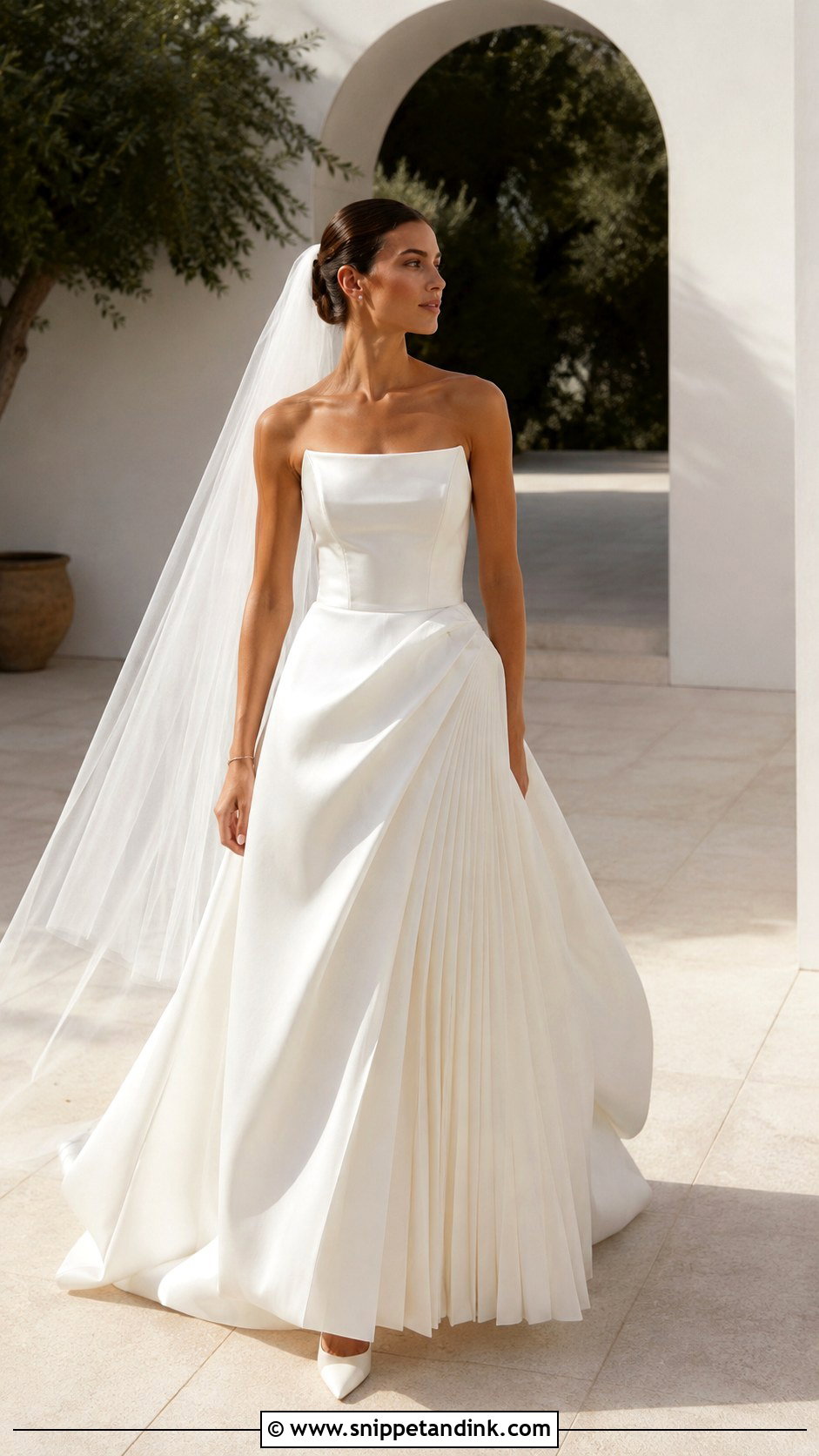 Pleated Skirt KYHA Wedding Dress With Minimal Jewelry - Snippet and Ink - 20 Khya Studios Wedding Dress Ideas
