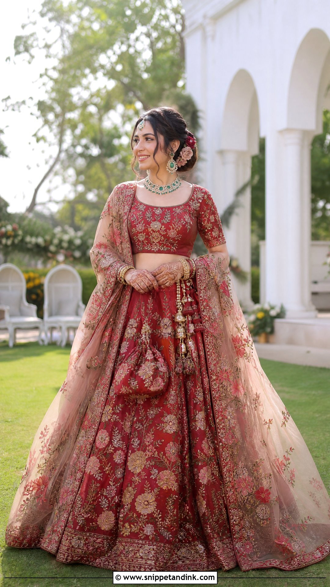 Red Floral Bridal Lehenga With Emerald Jewelry - Snippet and Ink - 20 Red Bridal Outfit Ideas